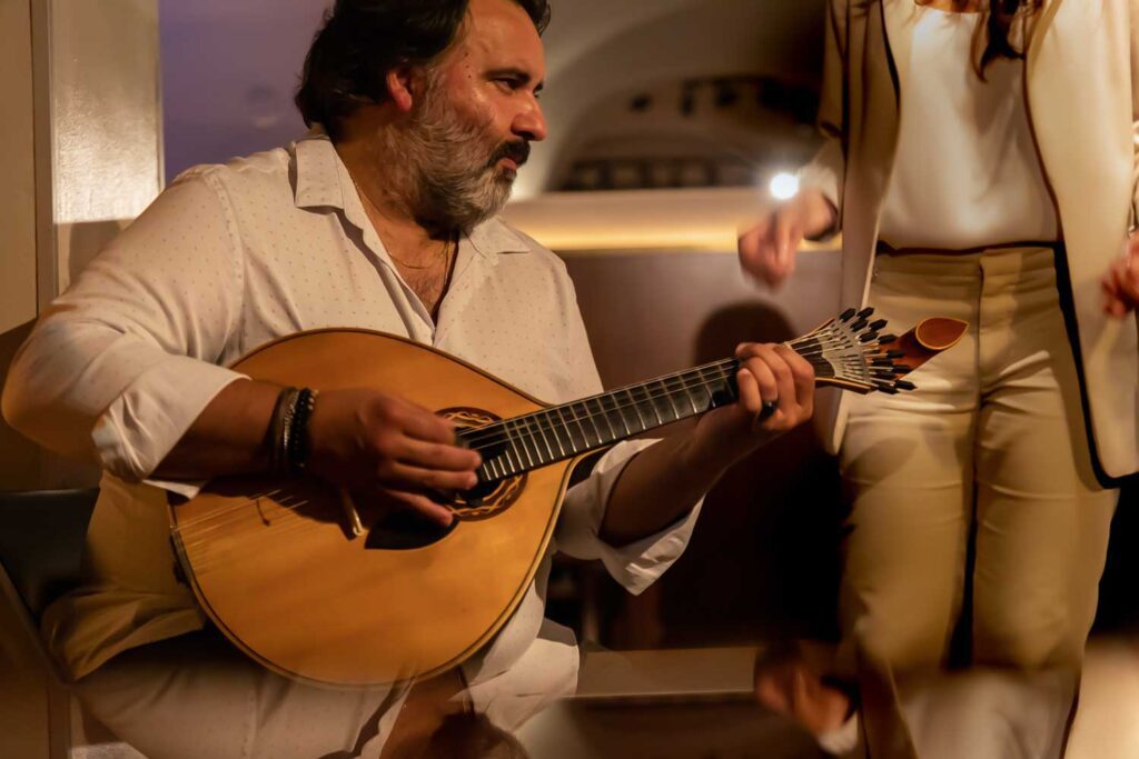 fado musician playing guitar in Lisbon, Portugal