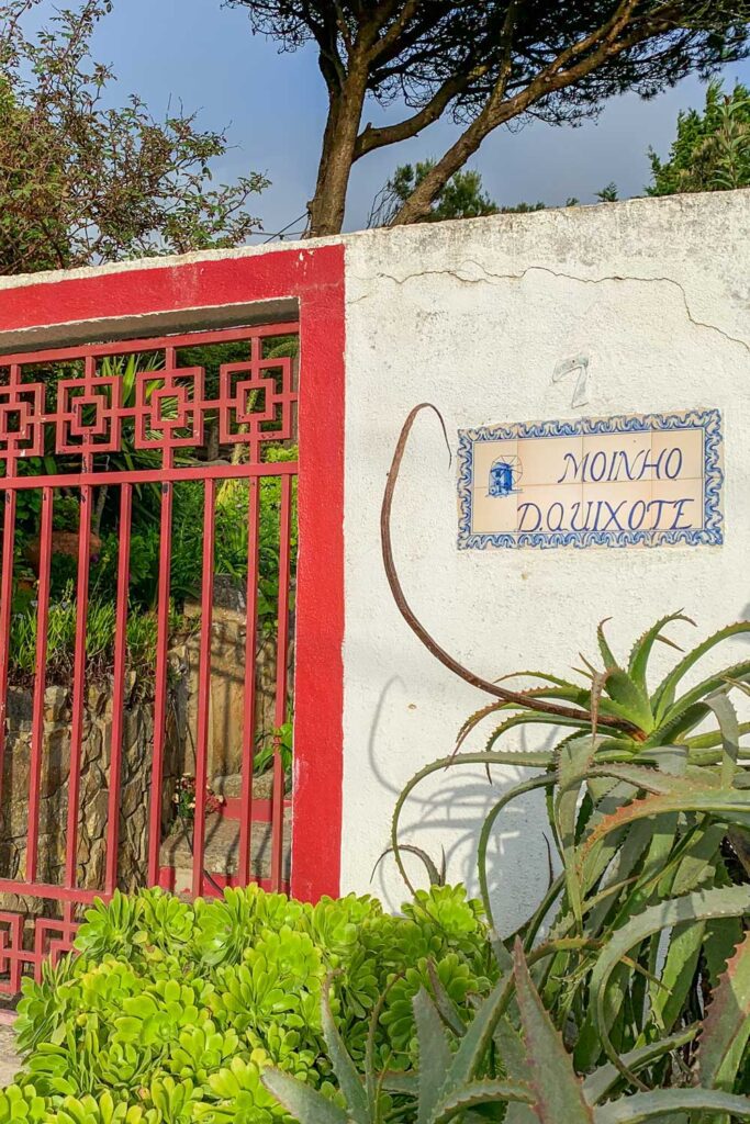 photo of Moinho Dom Quixote red door entrance to restaurant in Azoia, Portugal