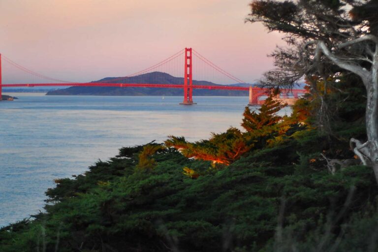 a landscape photograph at sunset of the Golden Gate Bridge in San Francisco, California
