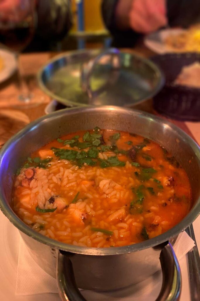 photograph of arroz de polo or octopus rice in Ericeria, Portugal